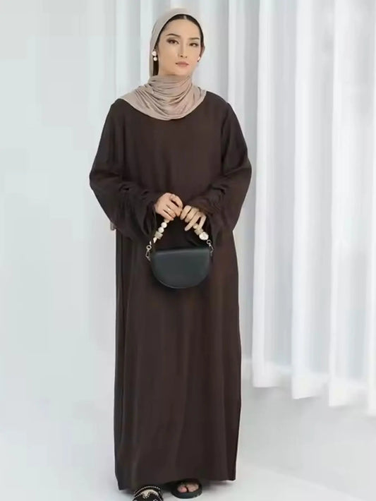 Unveil Your Glow – Luxe Lace-Up Sleeve Abaya for Eid Nights